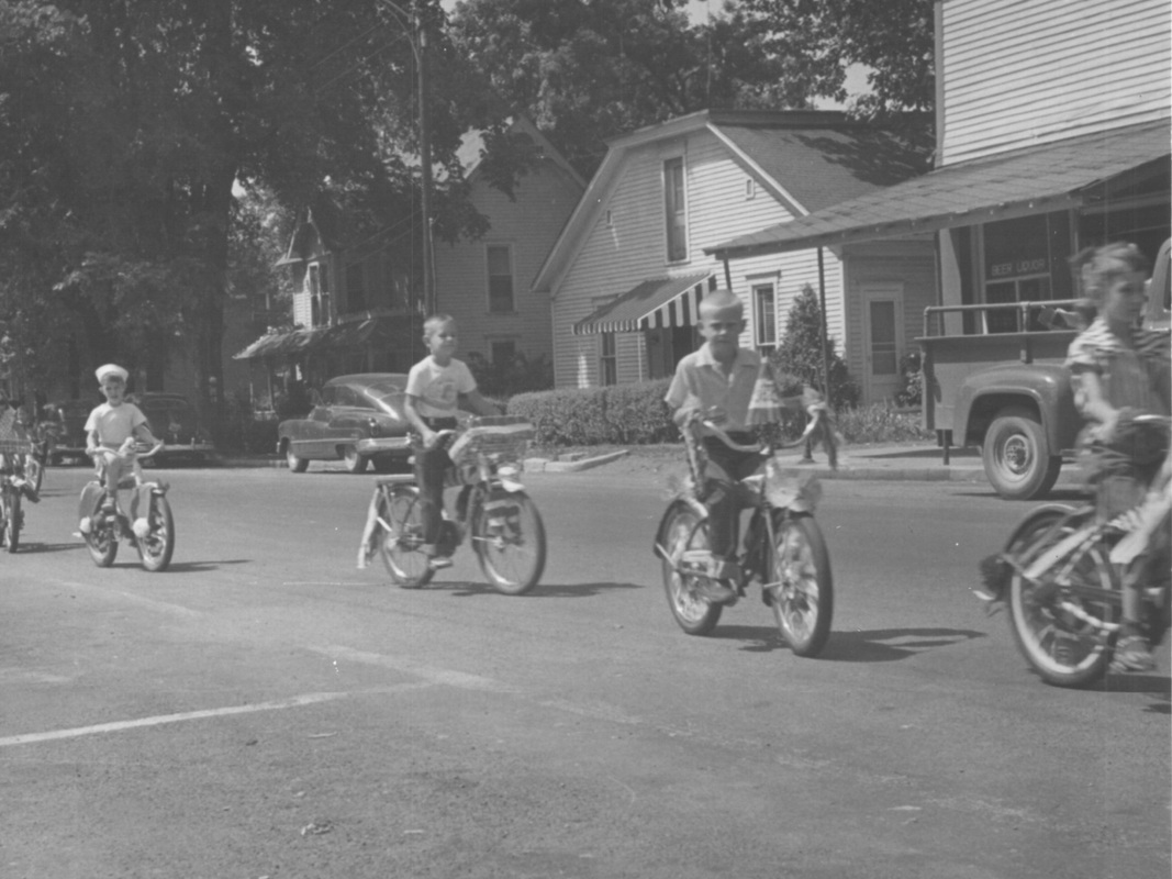 Bicycle parade down Main St. 1955.
