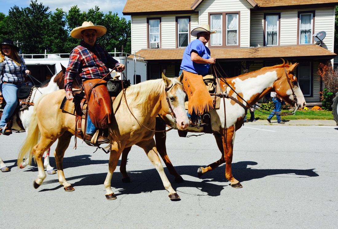people riding horses