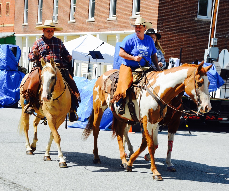 people riding horses