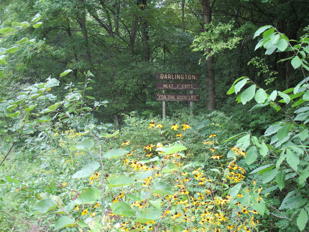 Grove Evans made this sign sometime in the late 1960's that is located on the south side of State Road 47 North just west of Darlington. His wife Joan once owned a Beauty Shop in town.